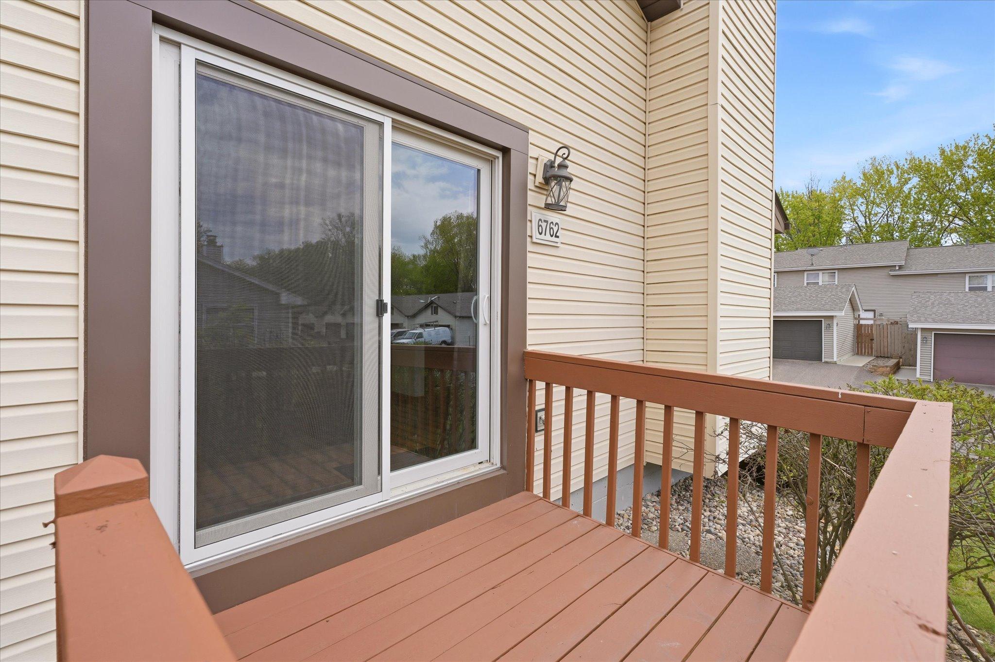 Private front deck offers the perfect spot to enjoy your morning coffee or relax outdoors.