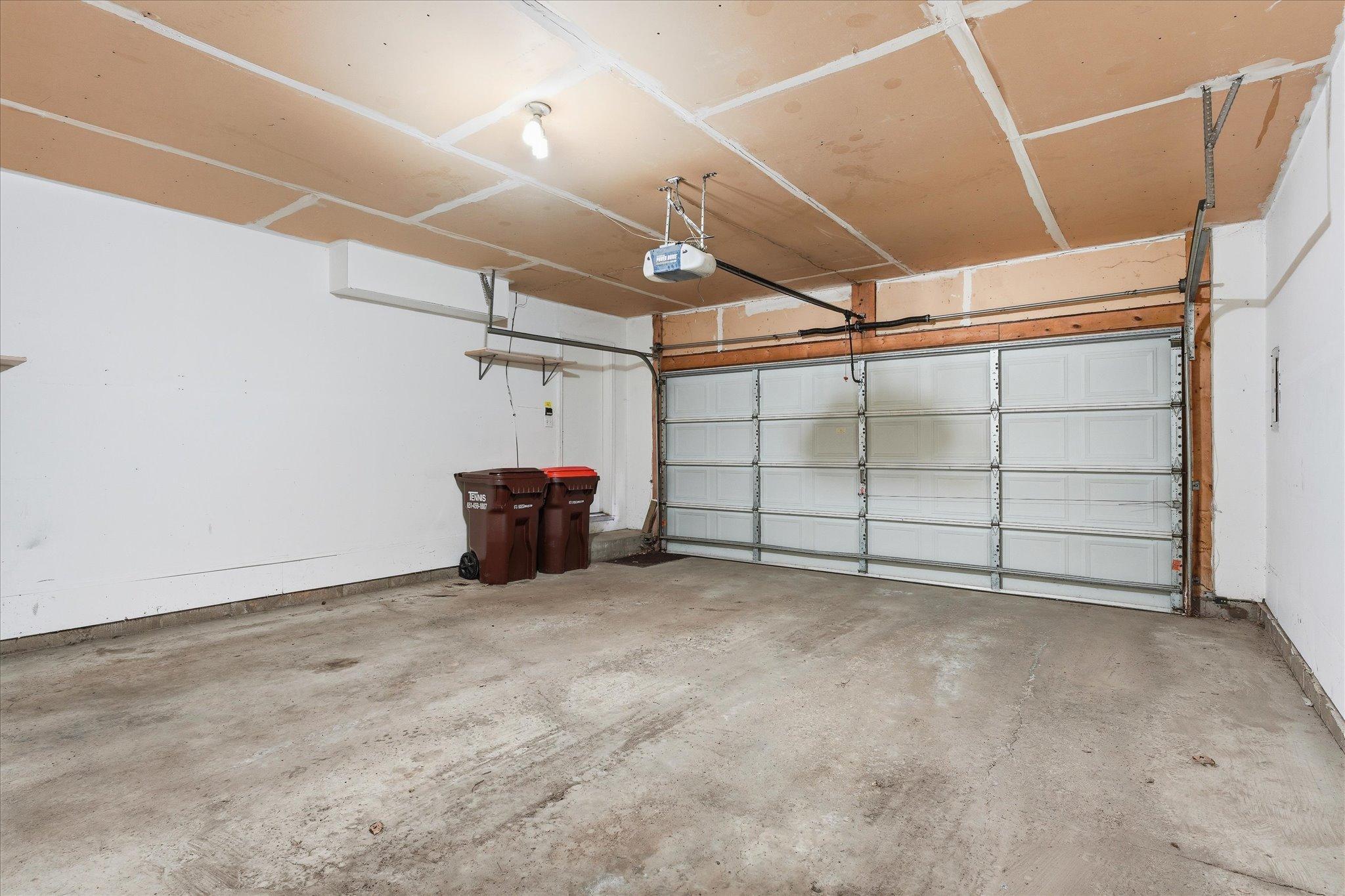 Attached 2-car garage offers excellent storage space along with room for vehicles and hobbies.