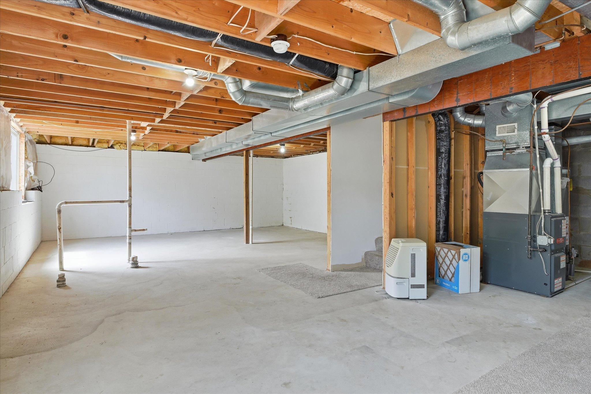 Huge unfinished lower level provides endless possibilities to add future living space and build instant equity.