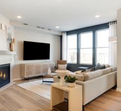 The Ashton living room has more than enough leg room for any furniture configuration you may want! Photo of model home.