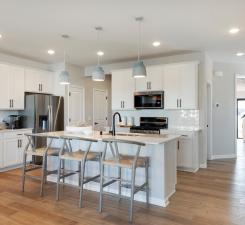 Welcome to the Ashton! This thoughtfully designed home is the perfect balance between elegance and function! Photo of model home.