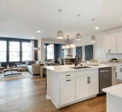 Wide open modern floorplan creates a memorable and striking home from any angle! Photo of model home.