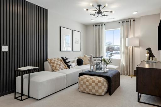 Loftâs open layout connects effortlessly to surrounding rooms, providing a bright and inviting upper-level retreat..jpg