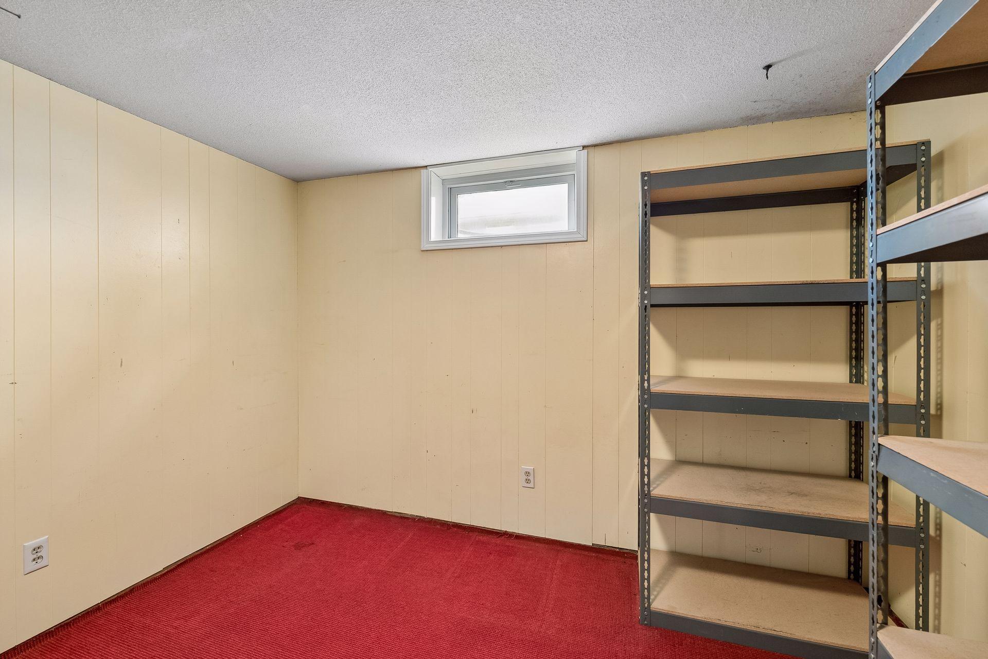 Lower level flex space could easily be used as an office, exercise room or converted to a bedroom.