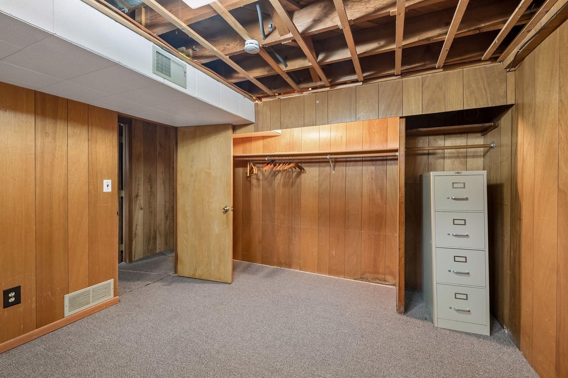 Lower level flex space #2. Add a ceiling and an egress window for additional bedroom space.