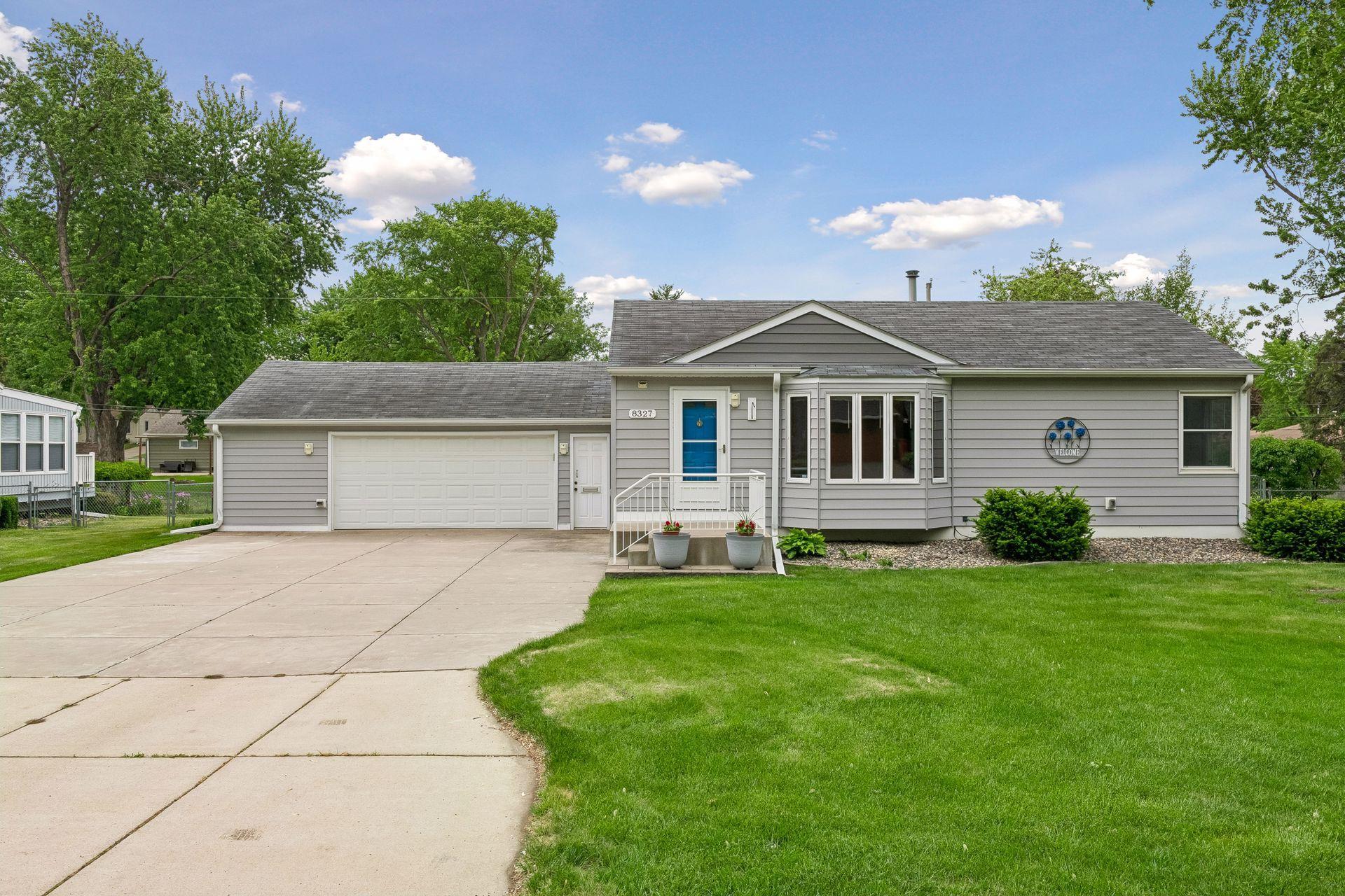 Oversized 2 car garage and concrete driveway