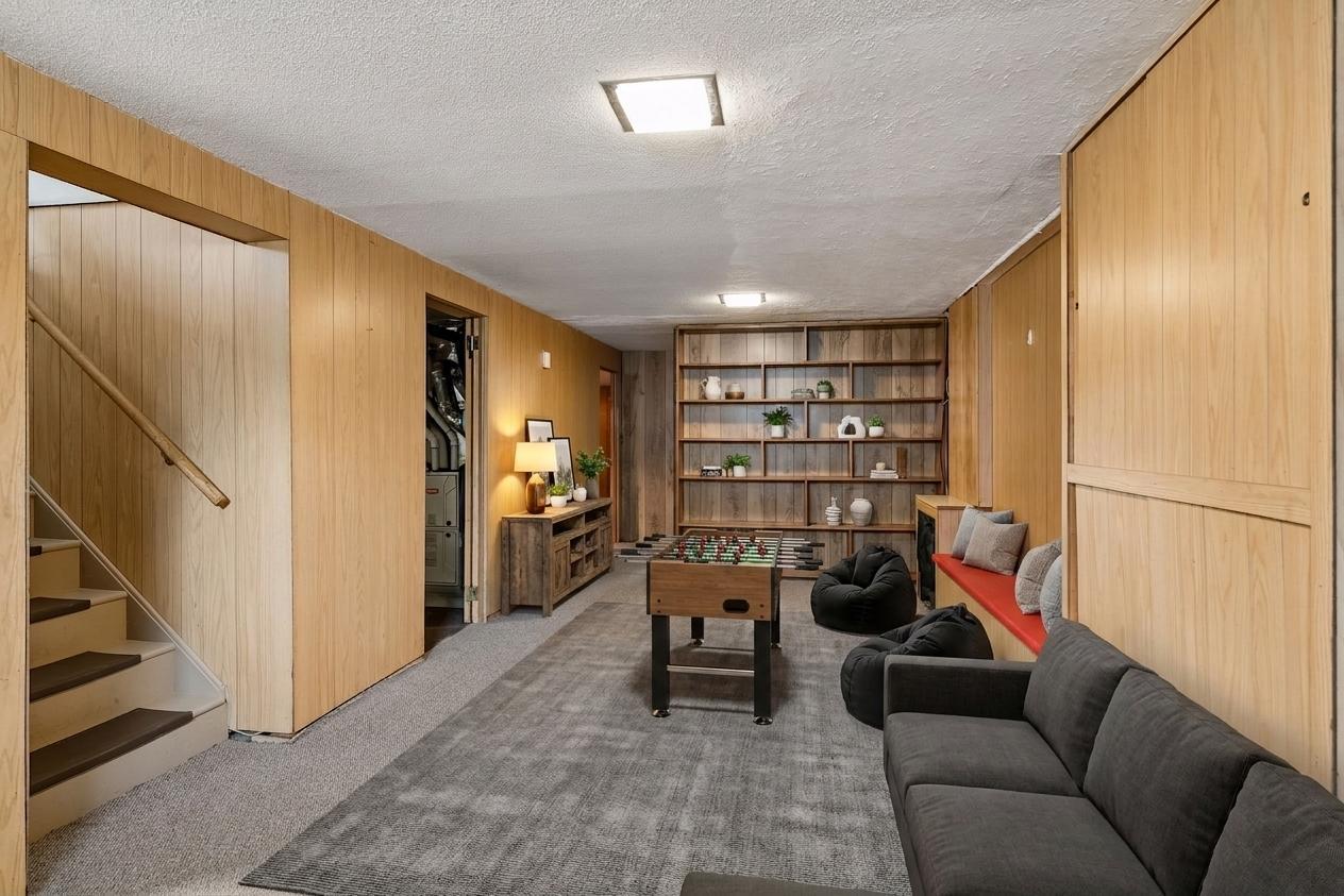 Virtually staged lower level family is great entertaining space