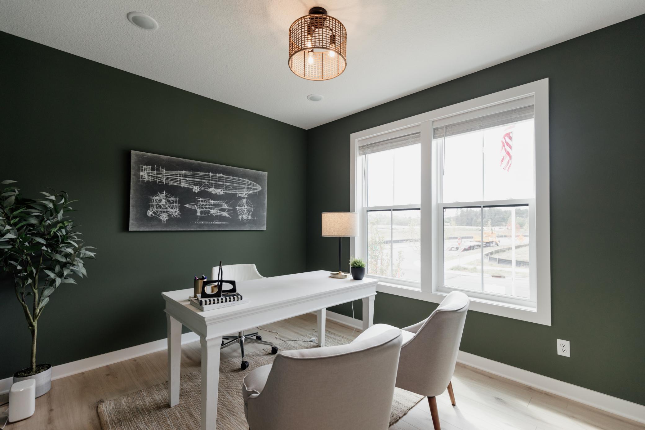 Front office/den. *Photo of similar home with the same layout.