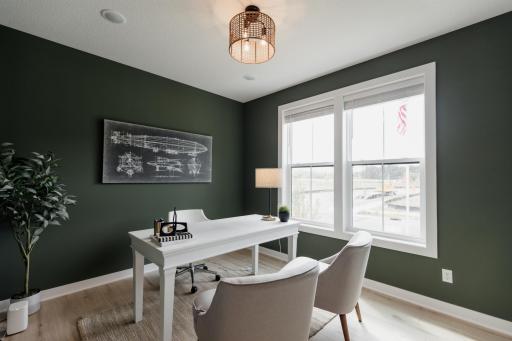 Front office/den. *Photo of similar home with the same layout.
