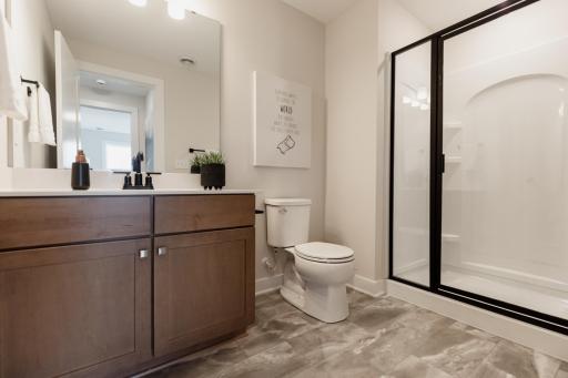 Lower level 3/4 bathroom. *Photo of similar home with the same layout.