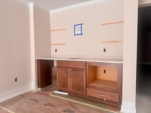 Progress photo of the lower level wet bar