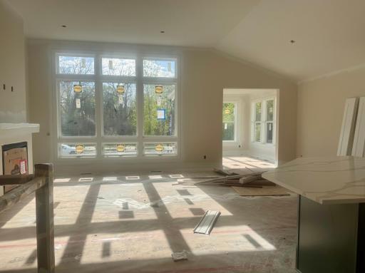 Progress photo of the main floor living space with vaulted ceilings