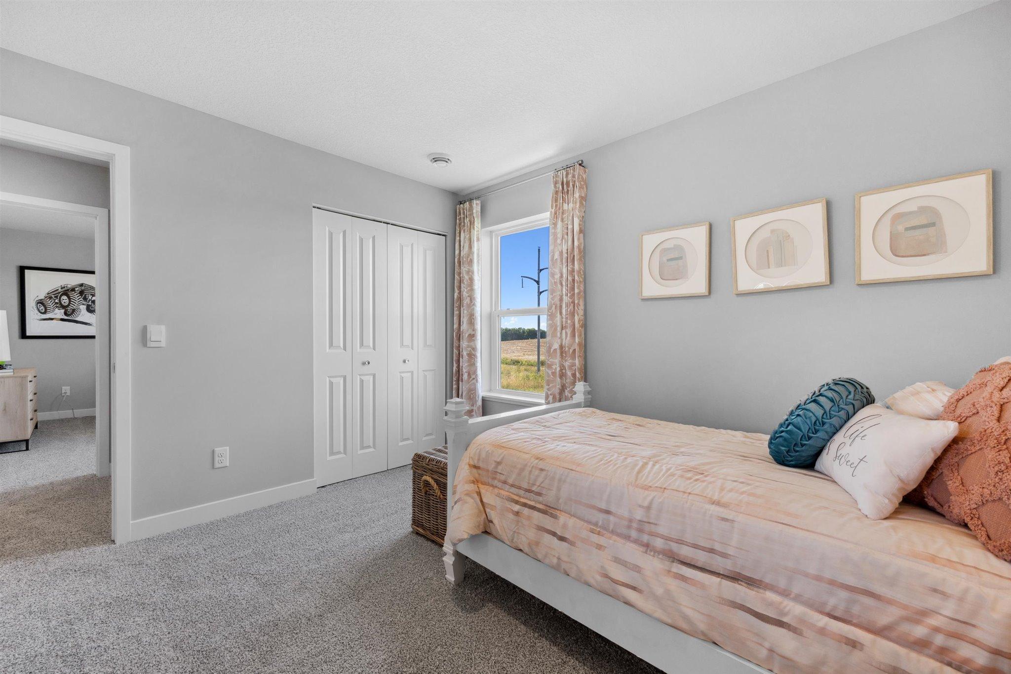 Bedroom #4 *Photo is of a past model home, finishes, selections, layout to vary.