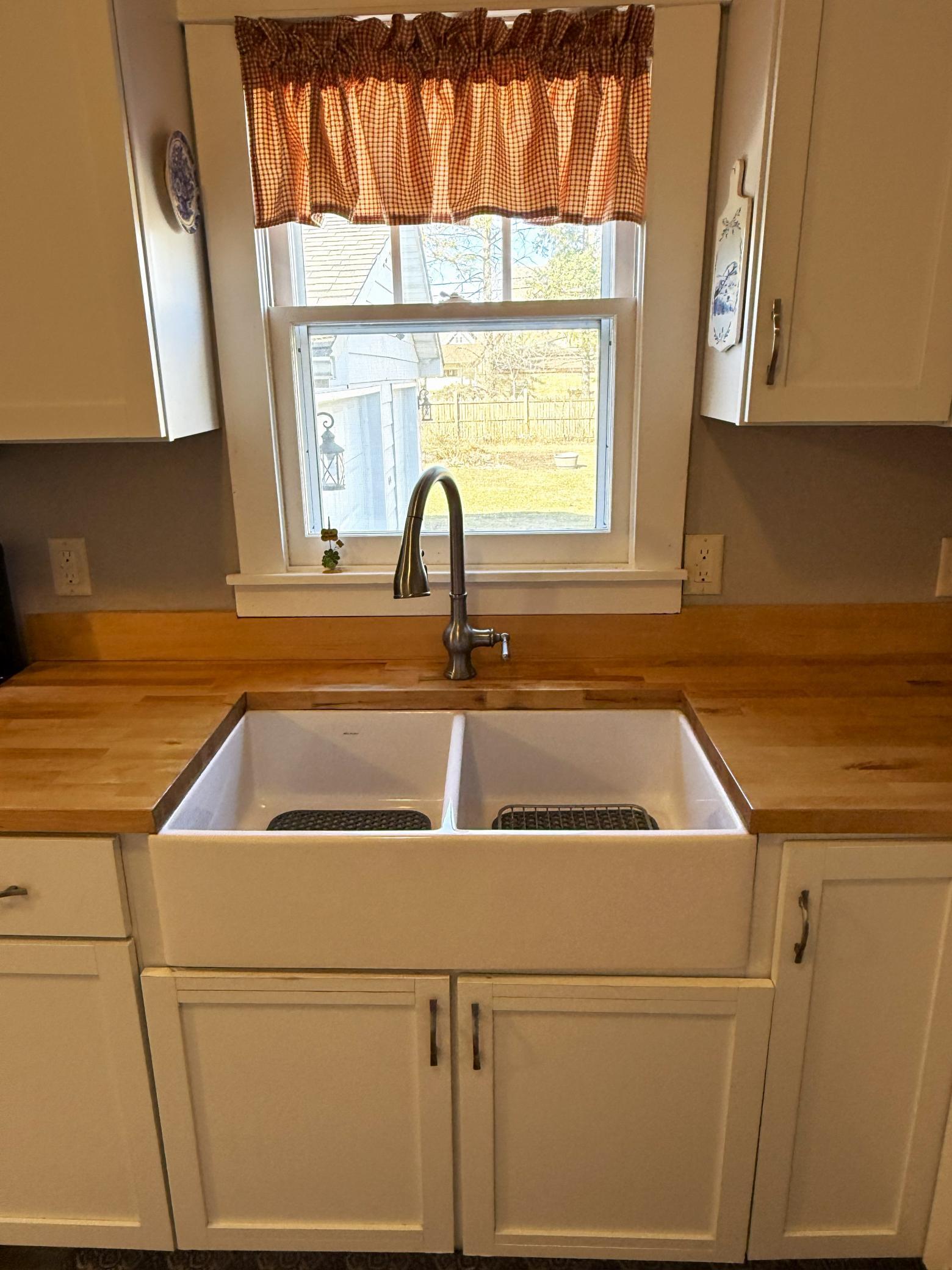 3 Kitchen Sink with View of the Yard and Garden.jpg