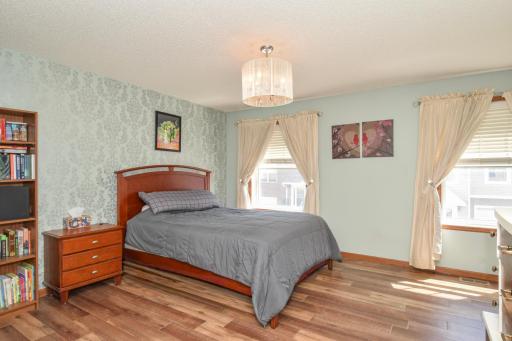 Primary suite with lots of light and room for plenty of space for a king or queen bed along with dressers and nightstands
