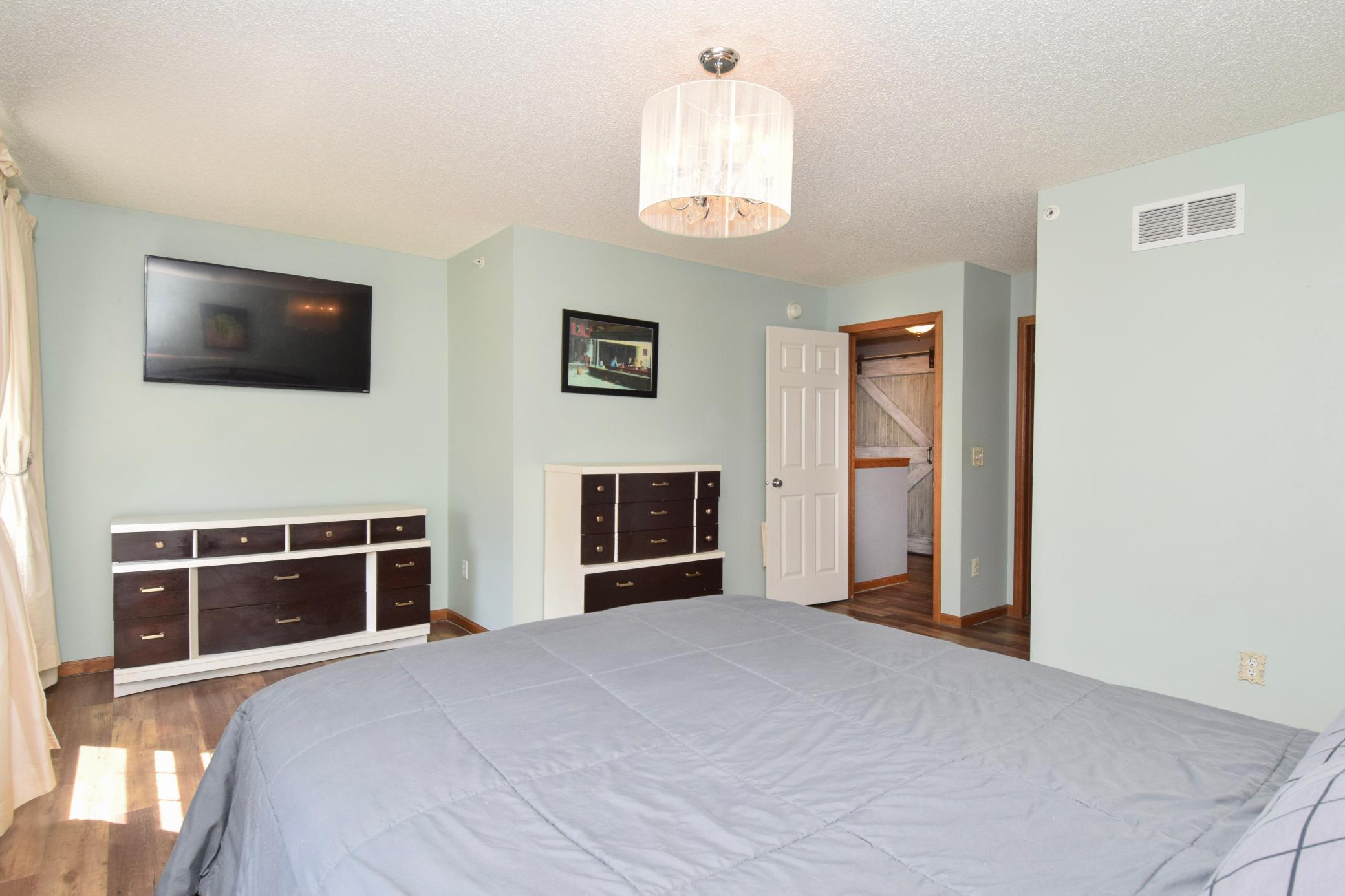 Primary suite conveniently located at the top of the stairs and near the upper level laundry.