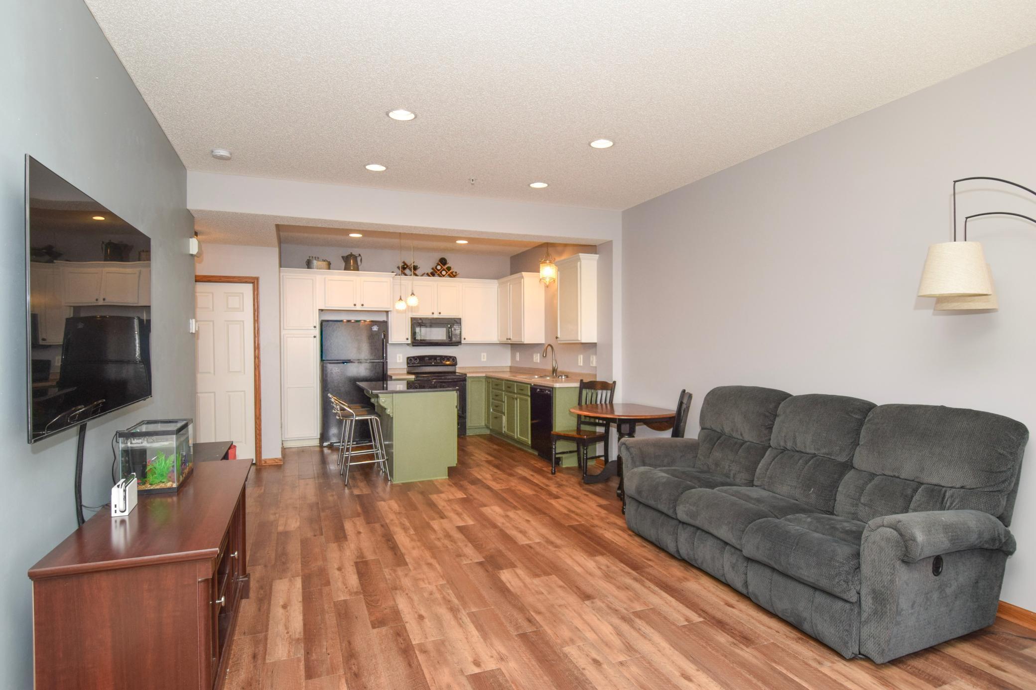 Main level living with hardwood floors and an open floor plan.