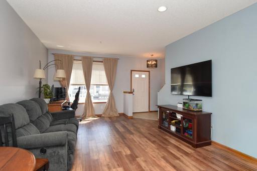 Entryway and large windows to let the light in.