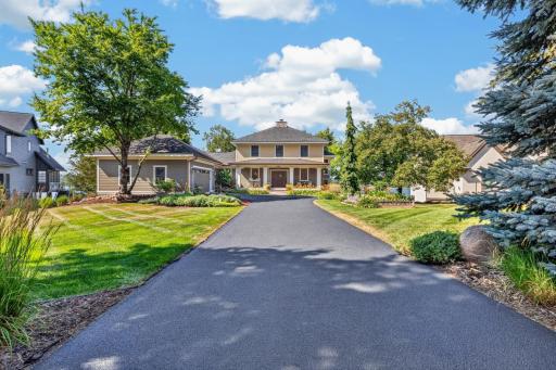 Some lake homes are defined by the house. At 5488 Fairlawn Shores Trail, the entire property sets it apart.