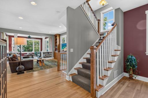 Upper Level features 3 Bedrooms, 2 bathrooms and Laundry. Open staircase features alder newel posts and railings