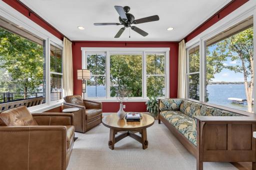Sun Room features oversized windows that offer panoramic views of Lower Prior Lake