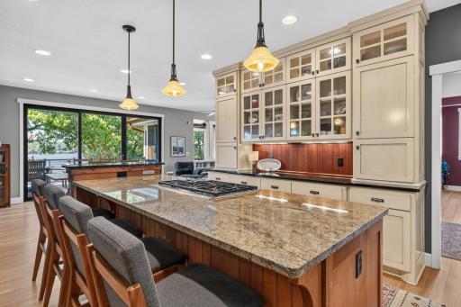 Granite countertops with Redwood paneled backsplash