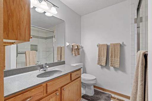 Spacious bathroom featuring a walk-in shower.