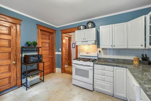 Kitchen - showing view into the dining room. The door on the left is to the walk-in pantry.