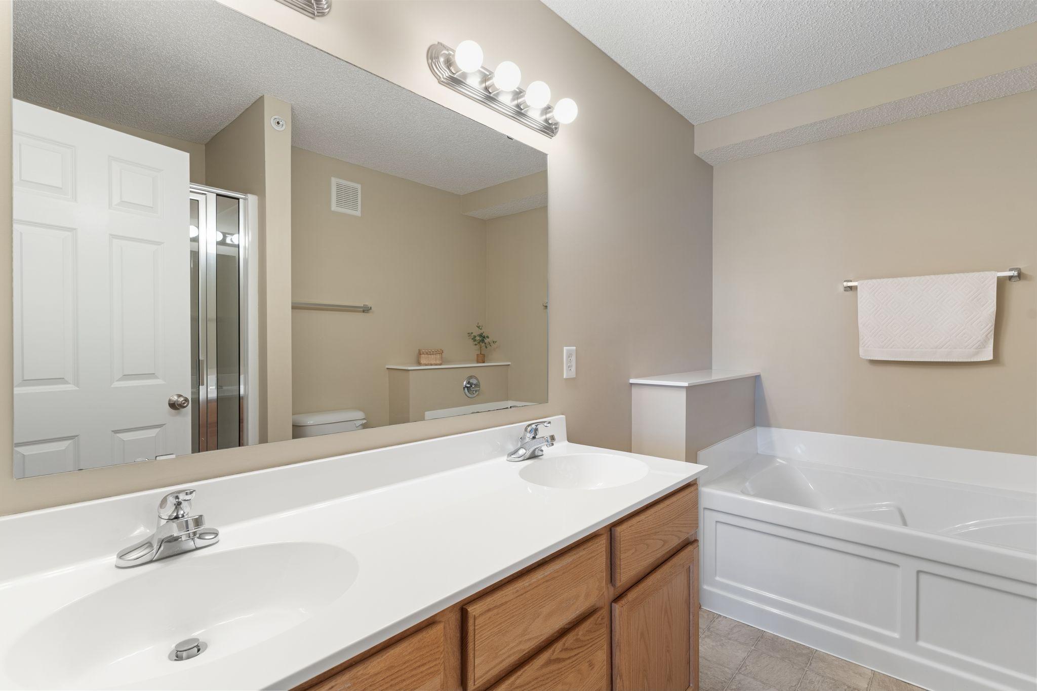 Private Primary Bathroom Dual Sinks, Separate Tub & Shower
