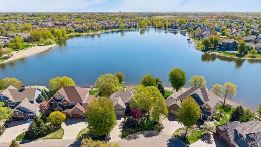 Elevated perspective capturing the homeâs setting along Sunrise Lake
