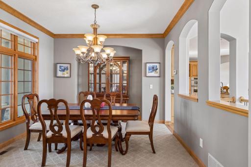 A spacious dining room, distinct yet seamlessly connected to the main level
