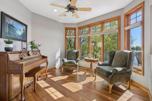 The sunroom lives up to its nameâa light-filled space to take in the views, ideal for reading, music, or quiet relaxation