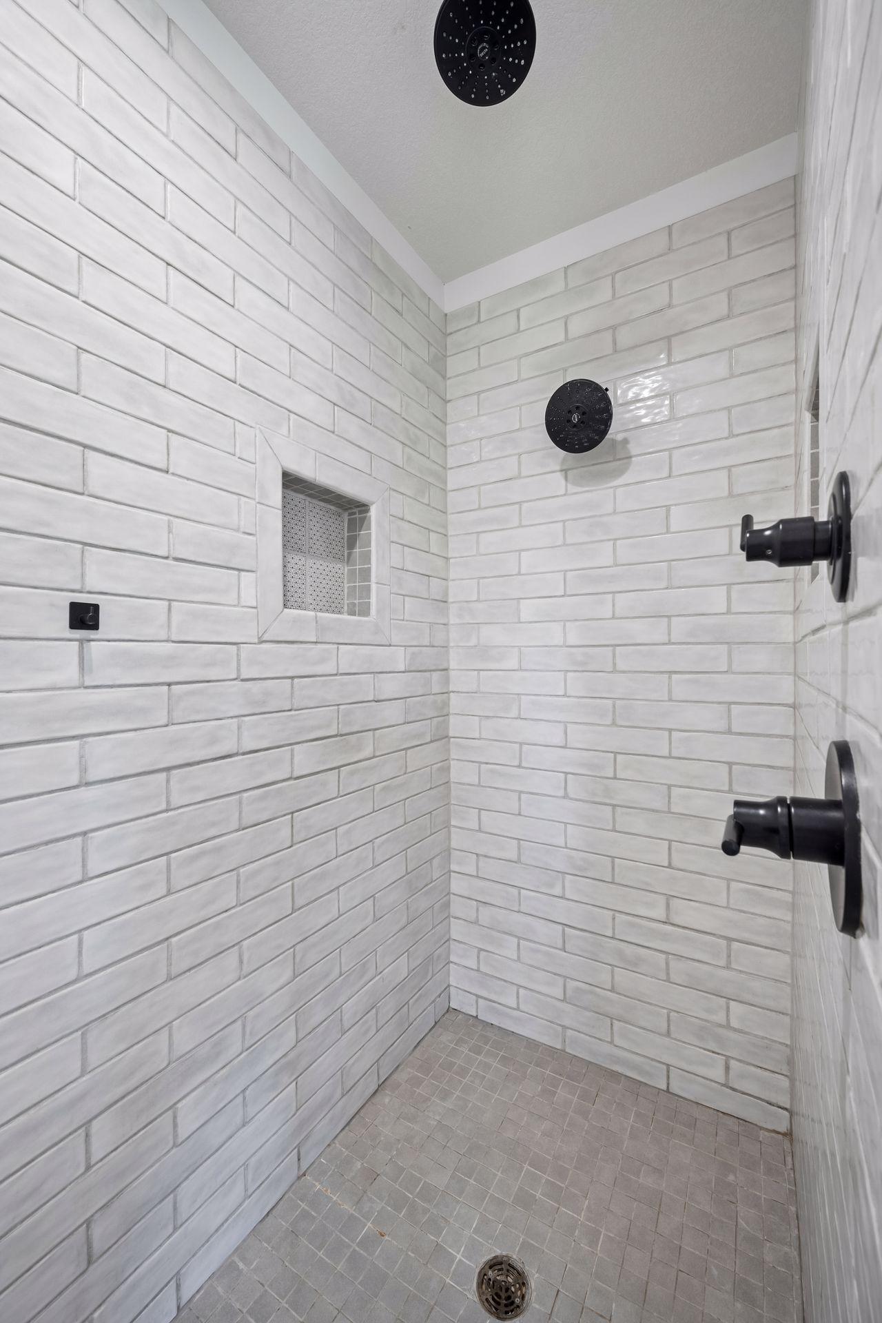 Primary walk-in shower.