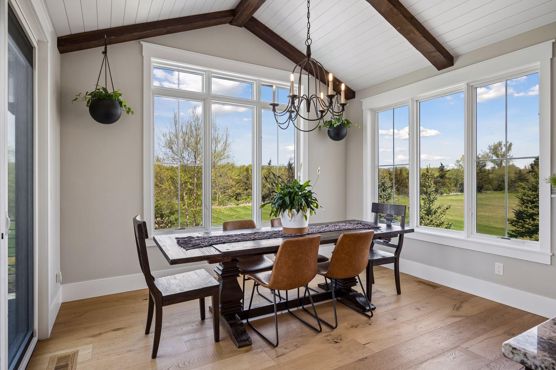 Spacious dining room with a sliding patio door leading to the deck.