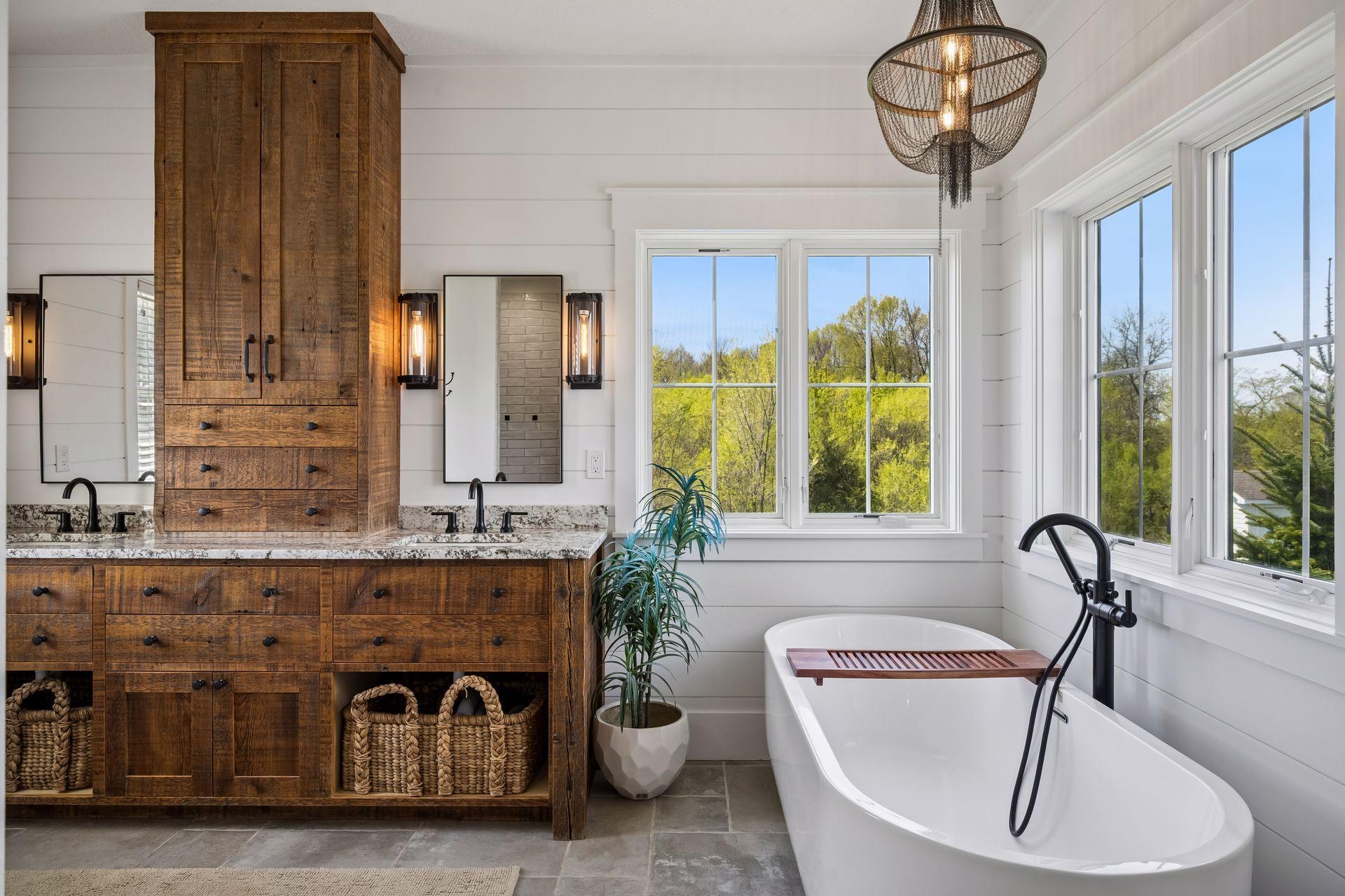 The spa-like ensuite showcases a dual vanity, relaxing soaker tub, and a beautifully tiled walk-in shower.