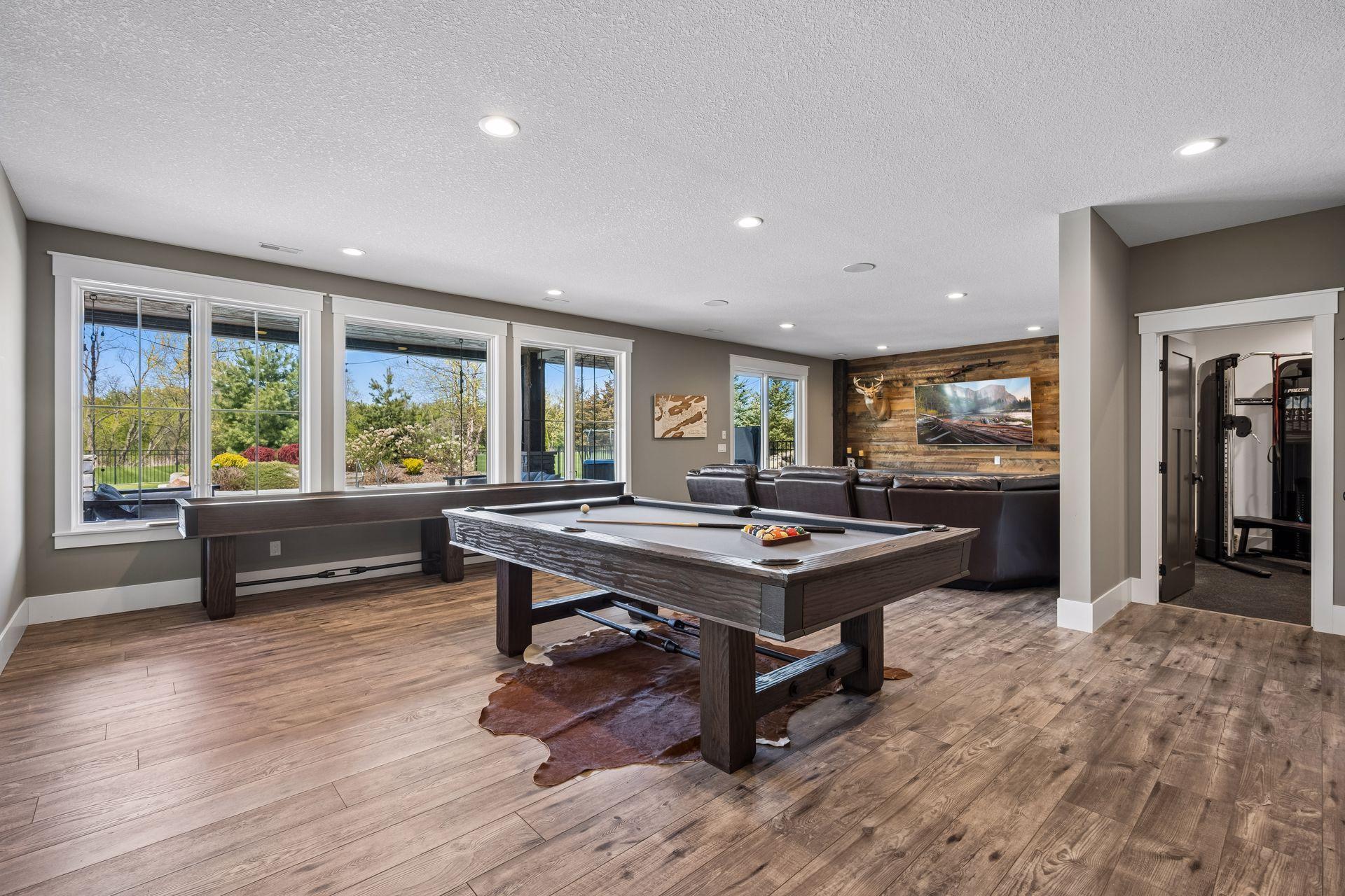 Head down to the walkout lower level where a fully open entertainment space seamlessly connects to the expansive family room.