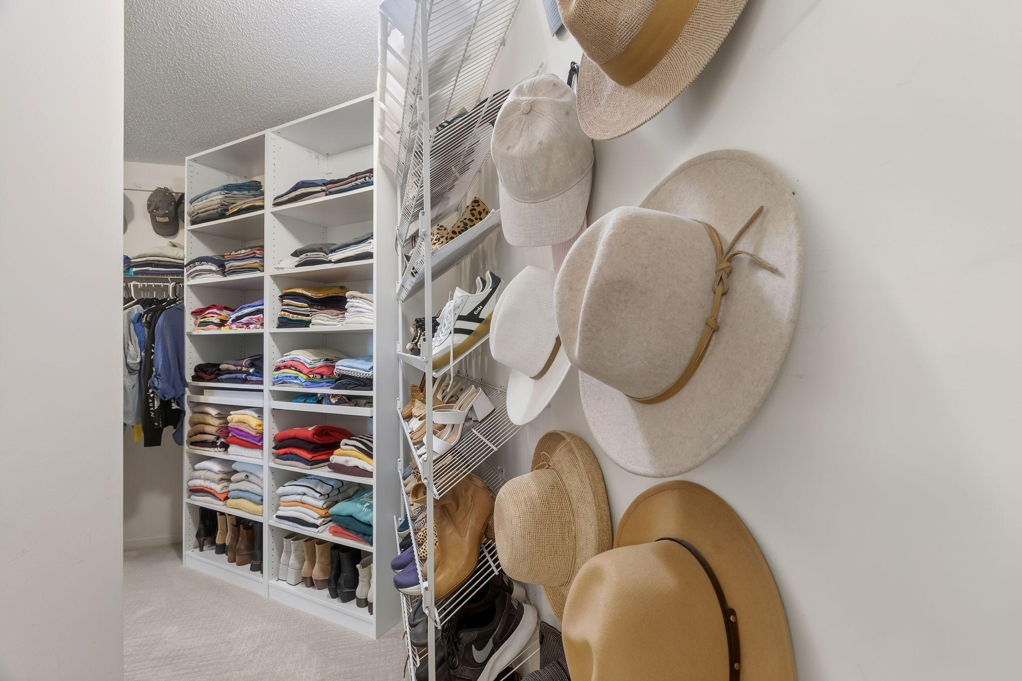 Large walk-in closet with built-in organizers