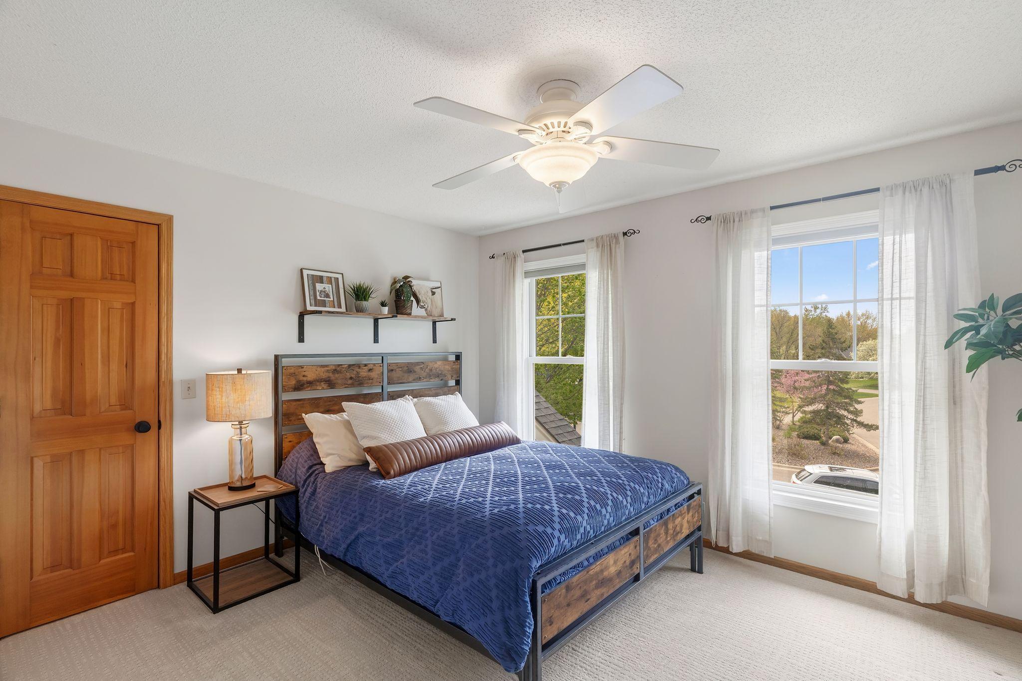 Upper level bedroom with walk-in closet