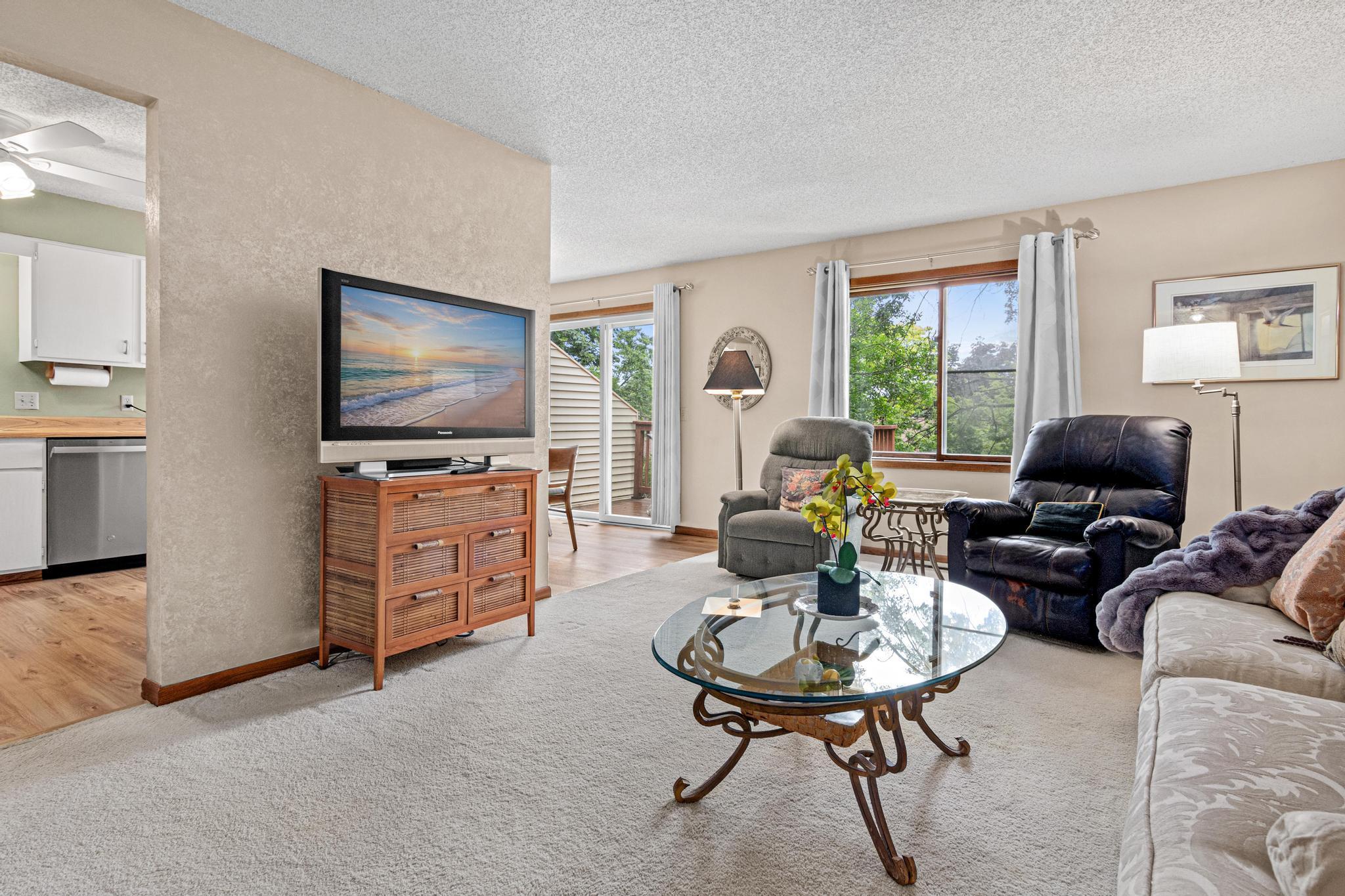 The large living room is bright and large.