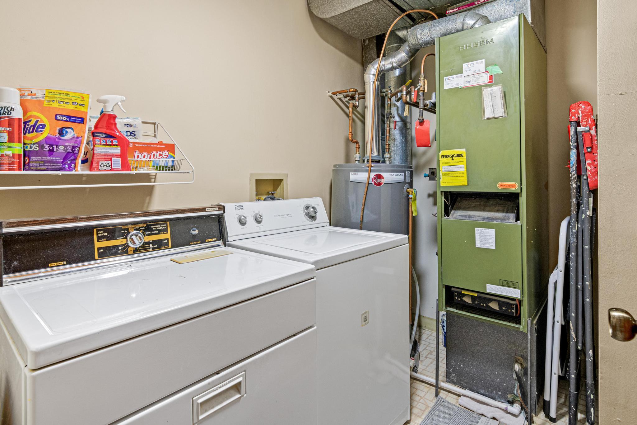 The laundry room is home to a high efficiency water heater that was replaced in late 2019.
