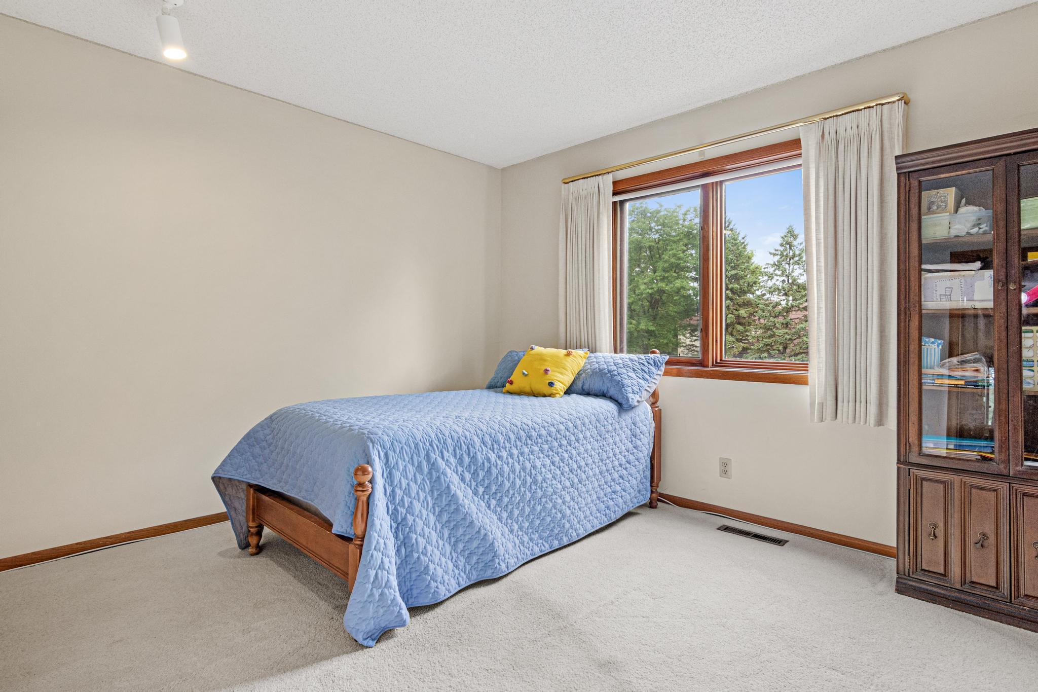 The second bedroom is bright and sunny!