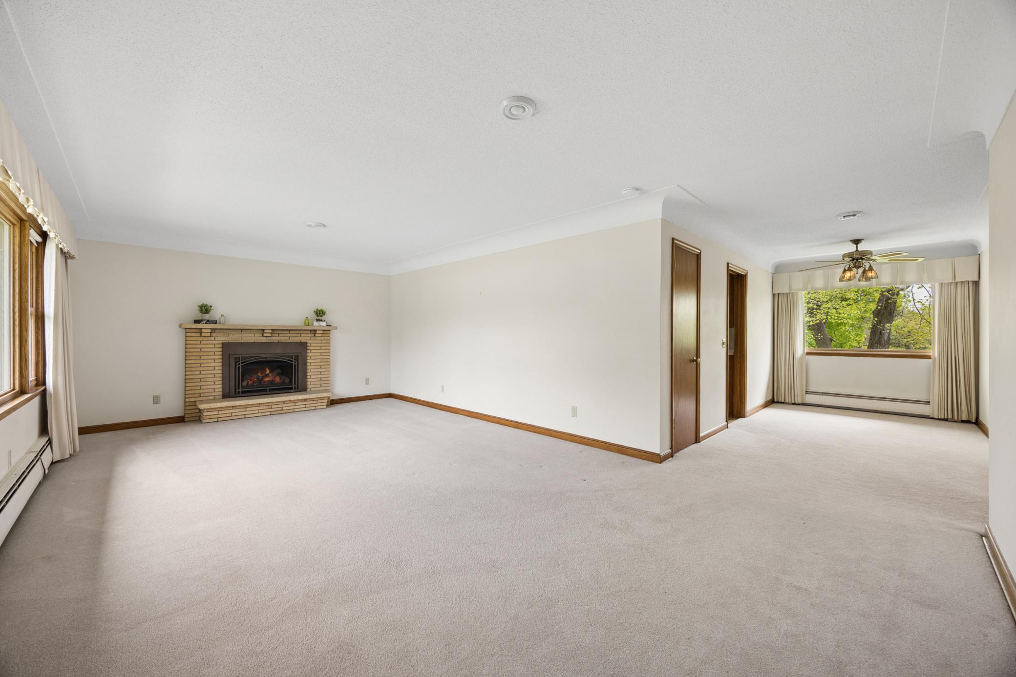 Living room opens to the formal dining room, perfect for entertaining.
