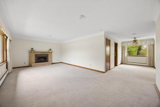 Living room opens to the formal dining room, perfect for entertaining.