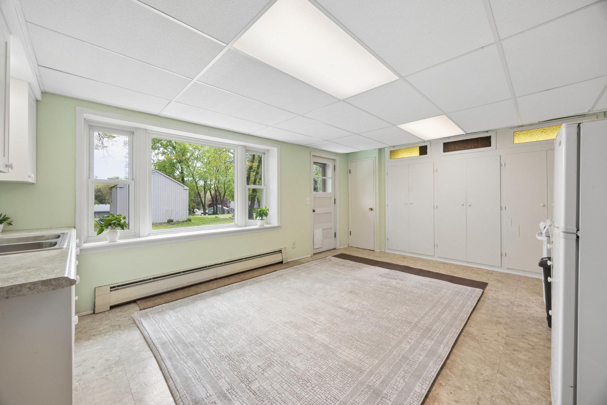Walk-out lower level includes a plethora of closets, great for seasonal storage.