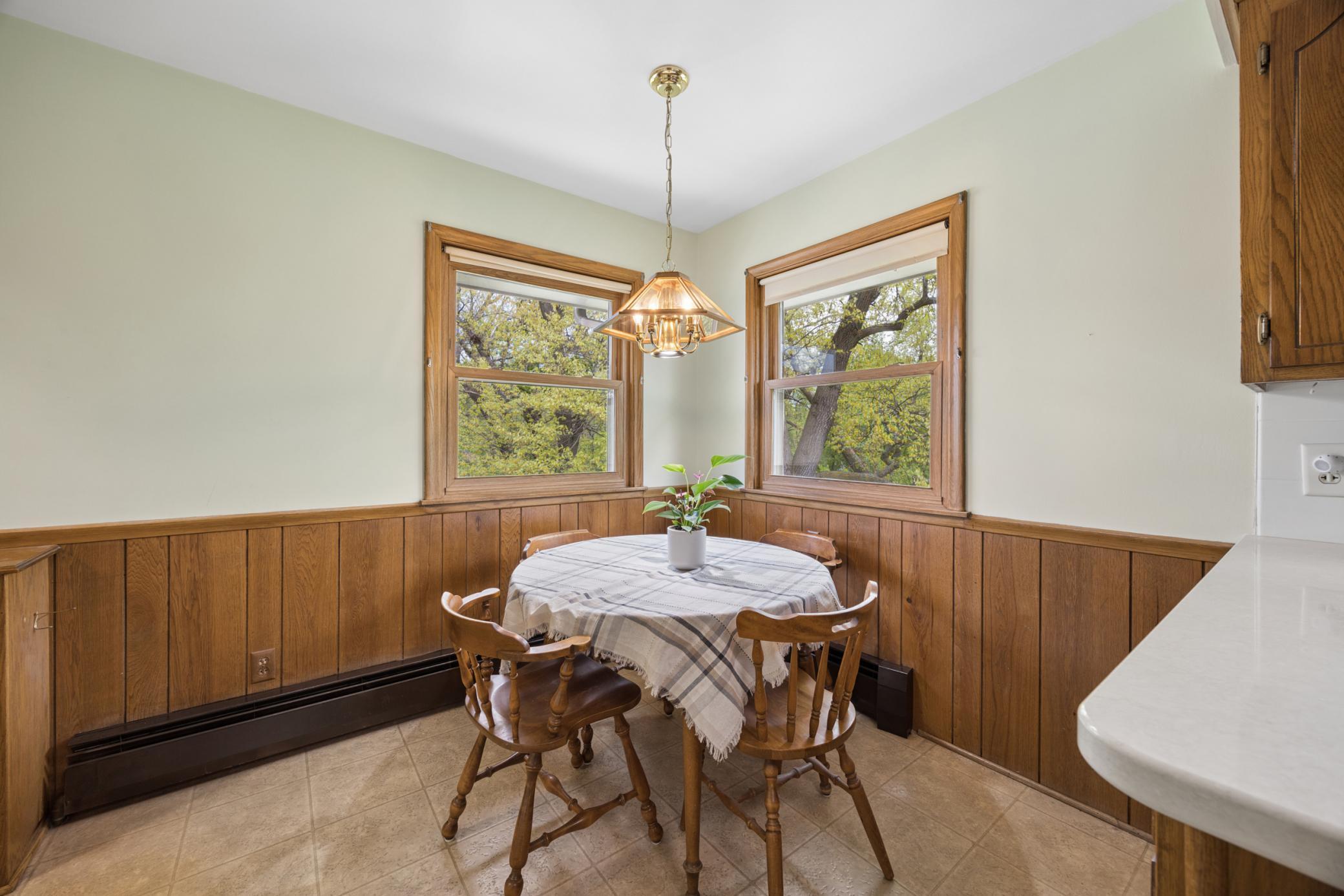 Eat in kitchen with lots of natural light and peaceful backyard views.