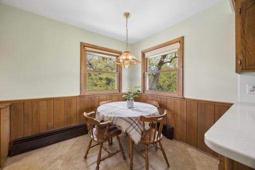 Eat in kitchen with lots of natural light and peaceful backyard views.