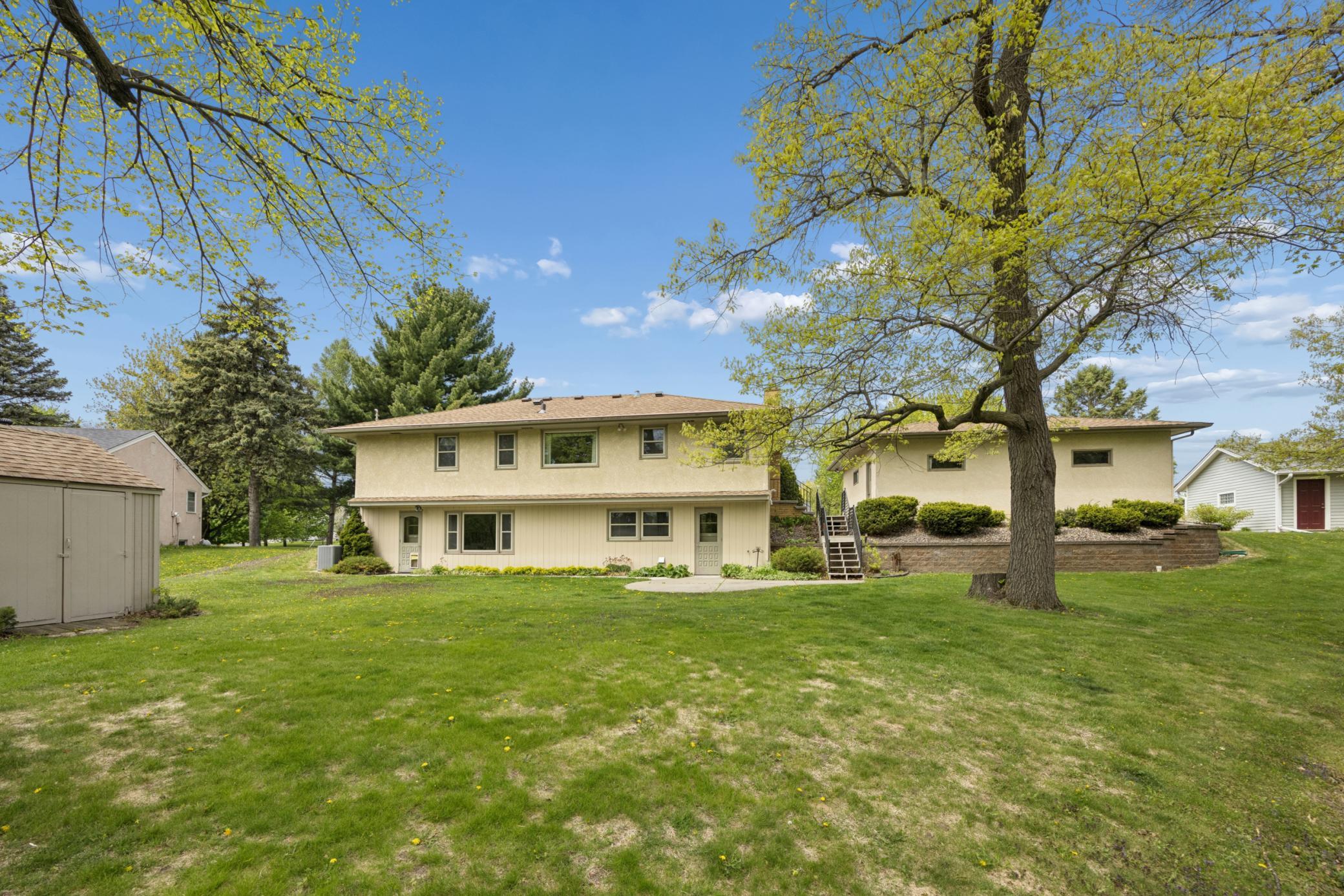 Expansive lot with park-like setting offering peace, privacy, and room to roam