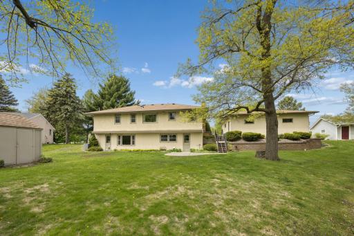 Expansive lot with park-like setting offering peace, privacy, and room to roam