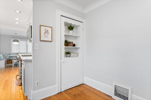 Decorative niche built into the door adds to the charm.