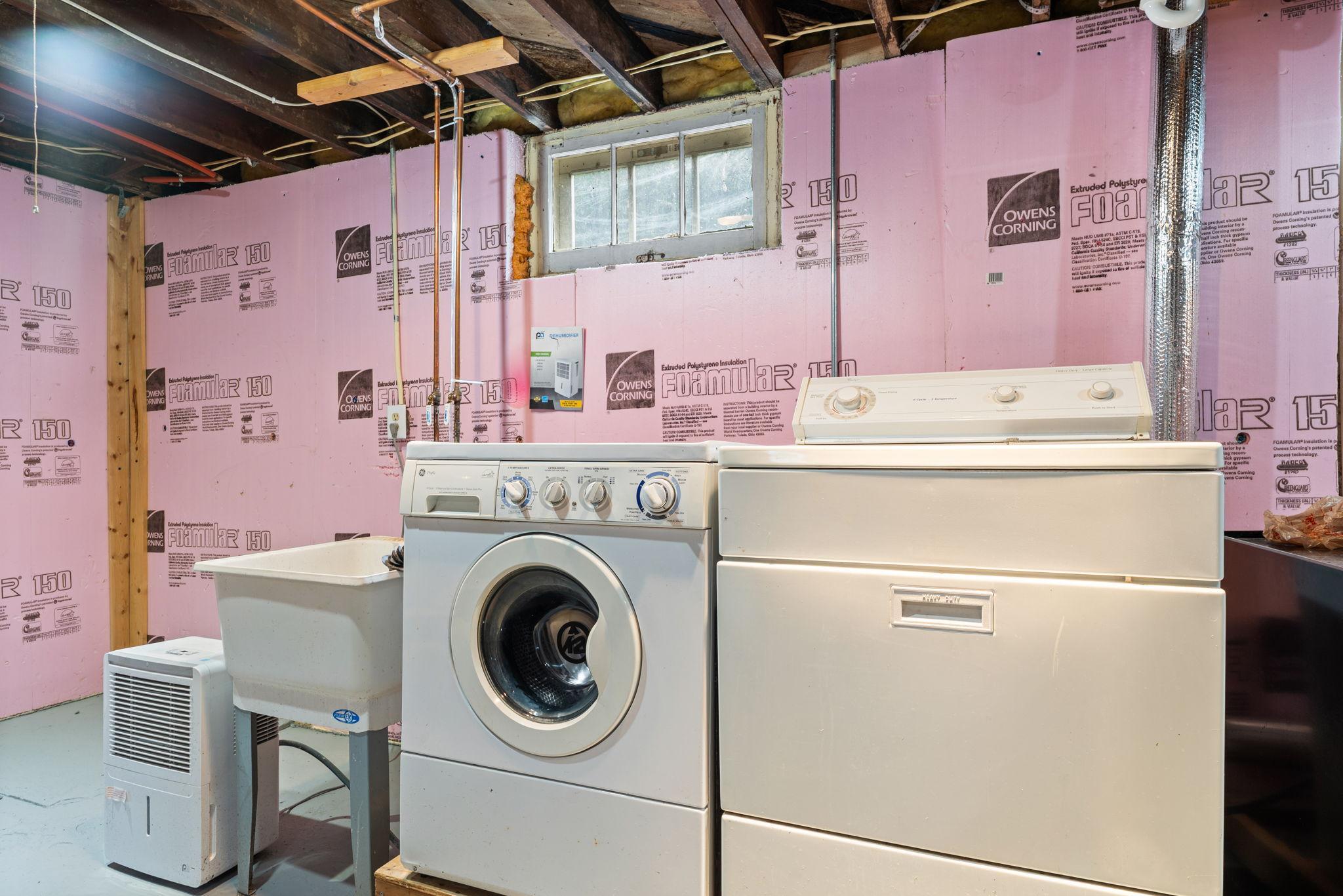 Laundry area with laundry sink